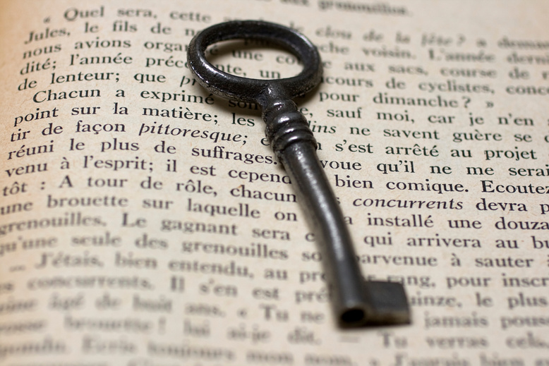 Old Key on a Open Book